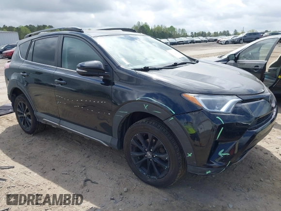 2018 Toyota RAV4 XLE with VIN 2T3RFREV1JW697044, listed as a IAAI auction lot 41891412 with 140,145 mi miles. Bid and sale history available at carsss.com. Image 1.