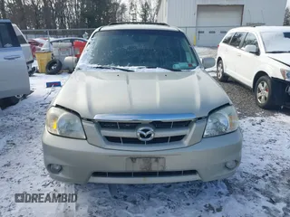 2006 Mazda Tribute LX with VIN 4F2YZ94126KM09467, listed as a IAAI auction lot 41324941 with 116,519 mi miles and . Bid and sale history available at DreamBid. Image 6.