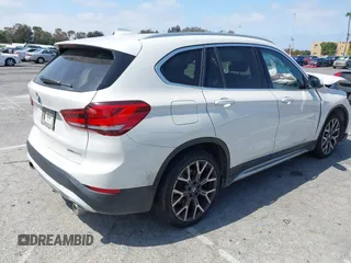 2020 BMW X1 xDrive28i with VIN WBXJG9C04L5R18165, listed as a IAAI auction lot 42313313 with 46,815 mi miles and . Bid and sale history available at DreamBid. Image 4.