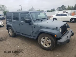2015 Jeep Wrangler Unlimited Sport with VIN 1C4BJWDGXFL551284, listed as a Copart auction lot 56905935 with 155,988 mi miles and Salvage title. Bid and sale history available at DreamBid. Image 4.