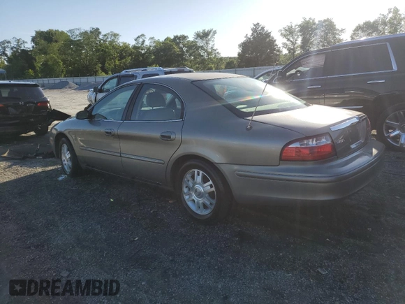 2004 Mercury Sable LS Premium with VIN 1MEHM55S84A614002, listed as a Copart auction lot 56582965 with 185,589 mi miles and Salvage title. Bid and sale history available at DreamBid. Image 2.