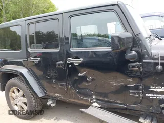 2015 Jeep Wrangler Unlimited Sahara with VIN 1C4HJWEG3FL661568, listed as a IAAI auction lot 42387810 with 140,927 mi miles and . Bid and sale history available at DreamBid. Image 13.