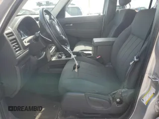 2011 Jeep Liberty Sport with VIN 1J4PN2GK7BW585608, listed as a Copart auction lot 61379875 with 144,904 mi miles and Salvage title. Bid and sale history available at DreamBid. Image 7.