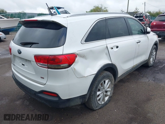 2016 Kia Sorento LX with VIN 5XYPG4A37GG174923, listed as a IAAI auction lot 42180134 with 101,436 mi miles and . Bid and sale history available at carsss.com. Image 4.