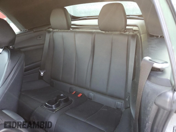 2016 BMW 2 Series 228i with VIN WBA1K9C52GV321963, listed as a Copart auction lot 71393424 with 118,029 mi miles and Salvage Title. Bid and sale history available at carsss.com. Image 10.