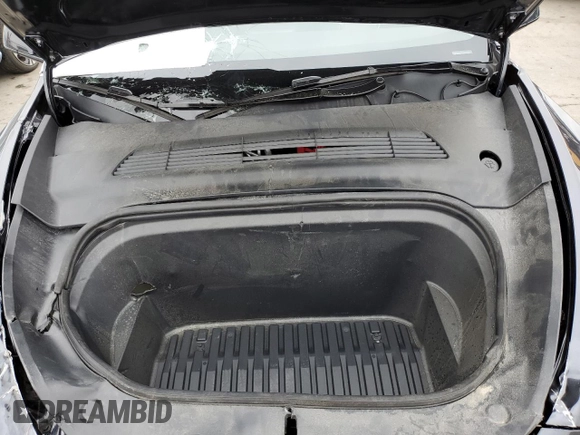 2025 Tesla Model Y Long Range with VIN 7SAYGDED4SF242721, listed as a Copart auction lot 56159955 with 7,131 mi miles and Salvage Title. Bid and sale history available at DreamBid. Image 12.