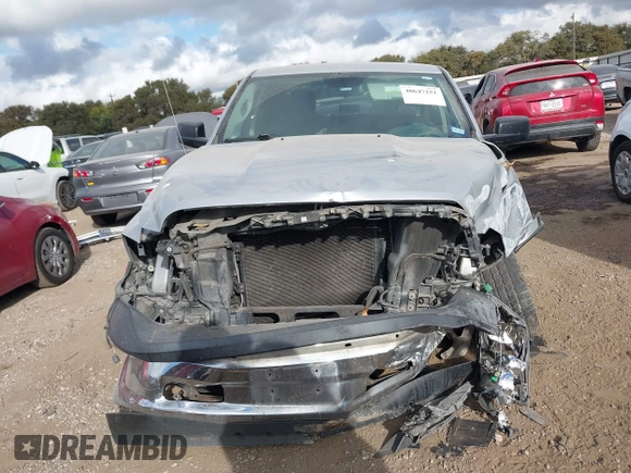 2013 Ram 1500 Tradesman z VIN 1C6RR6ST6DS661539, wystawiony jako IAAI lot #40647251 z przebiegiem 152 279 mil mil oraz . Historia ofert i sprzedaży dostępna na DreamBid. Obrazek 13.