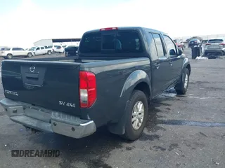 2015 Nissan Frontier SV with VIN 1N6AD0EV6FN751948, listed as a IAAI auction lot 42063935 with 52,244 mi miles and . Bid and sale history available at DreamBid. Image 4.
