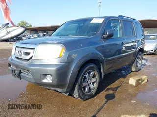 2010 Honda Pilot Touring with VIN 5FNYF3H87AB006023, listed as a IAAI auction lot 40310546 with 135,482 mi miles and . Bid and sale history available at carsss.com. Image 17.