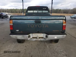 1996 Toyota Tacoma with VIN 4TAWM72N4TZ103661, listed as a Copart auction lot 86506054 with 197,518 mi miles and Salvage title. Bid and sale history available at DreamBid. Image 6.