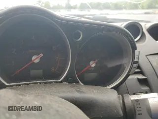 2005 Nissan 350Z Touring z VIN JN1AZ34E05M654954, wystawiony jako Copart lot #57591085 z przebiegiem Nie podano mil oraz Tytuł czysty. Historia ofert i sprzedaży dostępna na DreamBid. Obrazek 9.