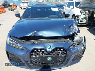 2021 BMW 4 Series 430i z VIN WBA53AP08MCG09446, wystawiony jako IAAI lot #41664926 z przebiegiem 18 544 mil mil oraz . Historia ofert i sprzedaży dostępna na DreamBid. Obrazek 12.