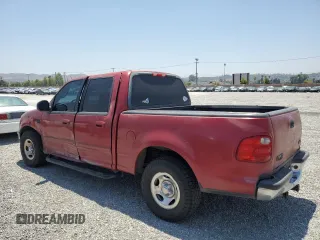 2001 Ford F-150 XLT с VIN 1FTRW07L01KF03457, выставлен на аукционе Copart как лот 60086725 с пробегом 205 917 миль миль и Списание • Salvage title. История ставок и продаж доступна на DreamBid. Изображение 2.