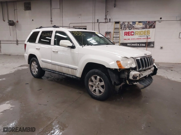 2009 Jeep Grand Cherokee Limited with VIN 1J8GR58K29C553812, listed as a IAAI auction lot 41520065 with 203,595 mi miles. Bid and sale history available at carsss.com. Image 1.