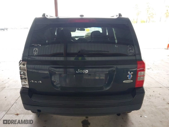 2014 Jeep Patriot Latitude with VIN 1C4NJRFB7ED784130, listed as a IAAI auction lot 41939216 with 141,250 mi miles. Bid and sale history available at carsss.com. Image 17.