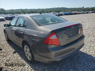 2012 Ford Fusion SE with VIN 3FAHP0HA1CR235996, listed as a Copart auction lot 61243025 with 165,218 mi miles and Salvage title. Bid and sale history available at DreamBid. Image 2.