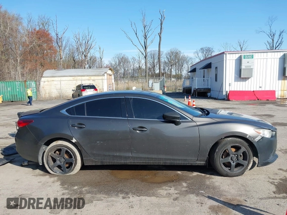 2016 Mazda 6 i Sport with VIN JM1GJ1U59G1402840, listed as a IAAI auction lot 41920724 with 147,527 mi miles and . Bid and sale history available at DreamBid. Image 13.