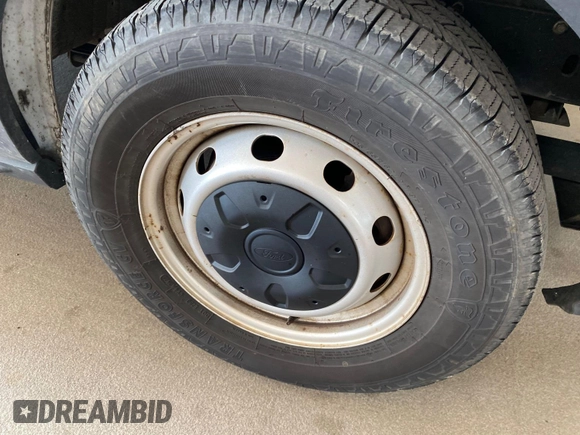 2019 Ford Transit with VIN 1FTYE1YM0KKB31938, listed as a IAAI auction lot 42667322 with 196,239 mi miles and . Bid and sale history available at DreamBid. Image 13.