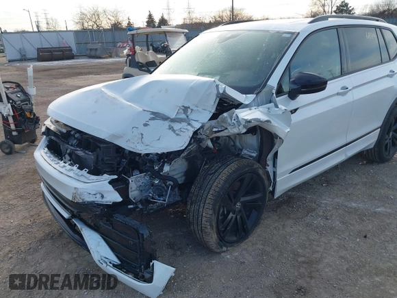 2023 Volkswagen Tiguan SE R-Line Black with VIN 3VV8B7AX9PM086225, listed as a IAAI auction lot 41276879 with Not provided miles and . Bid and sale history available at DreamBid. Image 6.