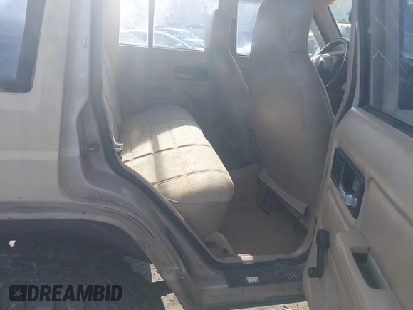 1995 Jeep Cherokee Sport with VIN 1J4FJ68S3SL555908, listed as a IAAI auction lot 42222016 with 283,444 mi miles and . Bid and sale history available at DreamBid. Image 8.