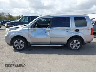 2012 Honda Pilot EX-L with VIN 5FNYF3H5XCB016571, listed as a IAAI auction lot 41905676 with 146,457 mi miles. Bid and sale history available at carsss.com. Image 6.