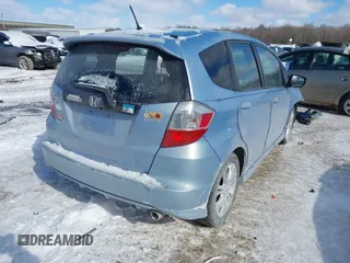 2009 Honda Fit Sport with VIN JHMGE884X9S026613, listed as a IAAI auction lot 41593112 with 144,736 mi miles. Bid and sale history available at carsss.com. Image 4.
