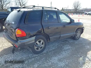 2004 Hyundai Santa Fe GLS with VIN KM8SC13E64U742880, listed as a IAAI auction lot 41764097 with 126,559 mi miles. Bid and sale history available at carsss.com. Image 4.