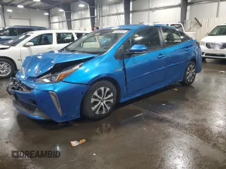 2022 Toyota Prius LE z VIN JTDL9MFU6N3040464, wystawiony jako Copart lot #53653025 z przebiegiem 65 004 mil mil oraz Szkoda całkowita • Salvage title. Historia ofert i sprzedaży dostępna na DreamBid. Obrazek 1.