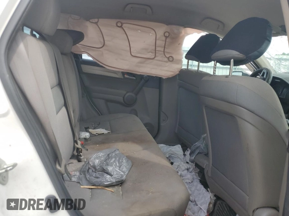 2011 Honda CR-V LX z VIN JHLRE3H30BC006667, wystawiony jako Copart lot #57303885 z przebiegiem Nie podano mil oraz Szkoda całkowita • Salvage title. Historia ofert i sprzedaży dostępna na DreamBid. Obrazek 11.