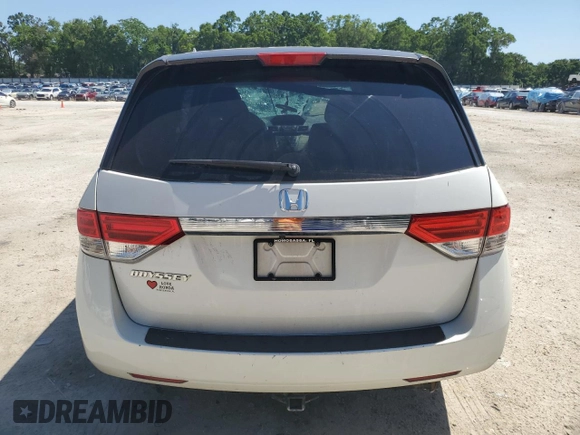2015 Honda Odyssey LX with VIN 5FNRL5H27FB054746, listed as a Copart auction lot 53023405 with 96,548 mi miles and Salvage Title. Bid and sale history available at DreamBid. Image 6.