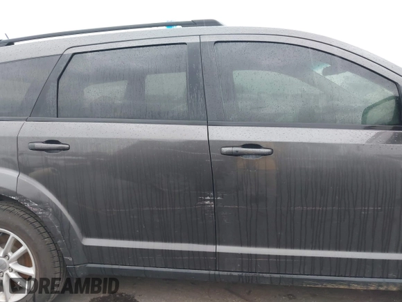 2017 Dodge Journey SXT z VIN 3C4PDCBG7HT511153, wystawiony jako IAAI lot #42098664 z przebiegiem 162 636 mil mil oraz . Historia ofert i sprzedaży dostępna na DreamBid. Obrazek 14.