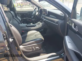 2023 Hyundai Palisade Calligraphy z VIN KM8R74GE4PU590391, wystawiony jako IAAI lot #42475508 z przebiegiem 38 015 mil mil oraz . Historia ofert i sprzedaży dostępna na DreamBid. Obrazek 5.