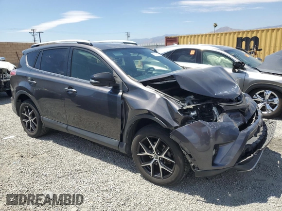 2016 Toyota RAV4 SE with VIN JTMNFREV2GJ072643, listed as a Copart auction lot 63879695 with 104,118 mi miles and Salvage title. Bid and sale history available at DreamBid. Image 4.