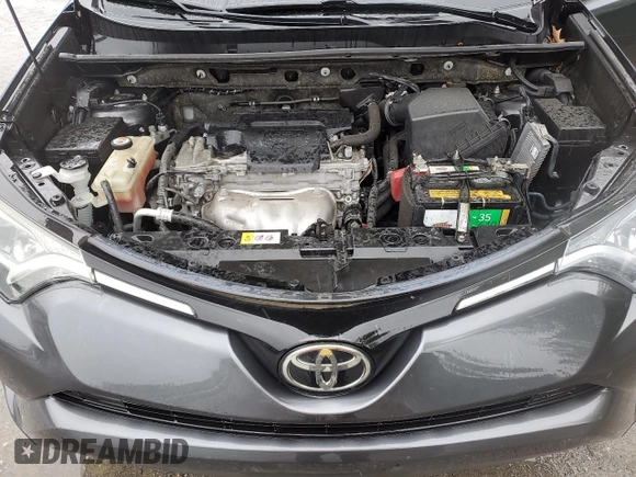 2017 Toyota RAV4 LE z VIN JTMZFREV5HJ130828, wystawiony jako Copart lot #58400825 z przebiegiem 99 116 mil mil oraz Szkoda całkowita • Salvage title. Historia ofert i sprzedaży dostępna na DreamBid. Obrazek 12.