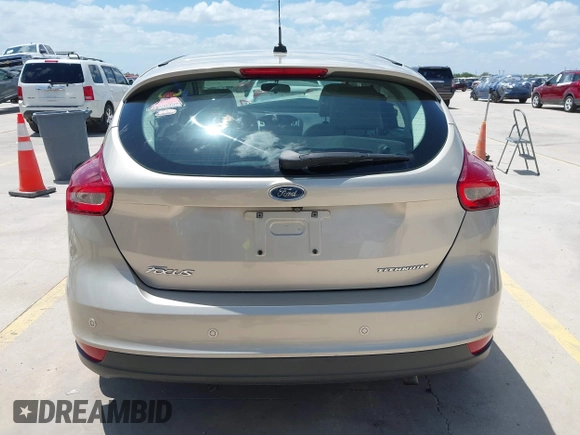 2018 Ford Focus Titanium z VIN 1FADP3N25JL279623, wystawiony jako IAAI lot #42534936 z przebiegiem 74 440 mil mil oraz . Historia ofert i sprzedaży dostępna na DreamBid. Obrazek 17.
