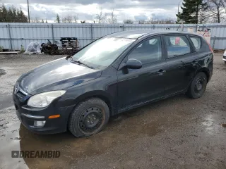 2009 Hyundai Elantra z VIN KMHDC85E89U047984, wystawiony jako Copart lot #82118674 z przebiegiem 182 119 mil mil oraz Czysty tytuł • Clean title. Historia ofert i sprzedaży dostępna na DreamBid. Obrazek 1.