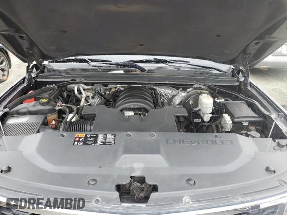 2015 Chevrolet Tahoe LT with VIN 1GNSCBKC9FR118286, listed as a Copart auction lot 56168375 with 144,824 mi miles and Salvage title. Bid and sale history available at DreamBid. Image 12.