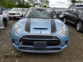 2017 MINI Clubman Cooper S z VIN WMWLU5C5XH2E83566, wystawiony jako Copart lot #57919305 z przebiegiem 89 983 mil mil oraz Tytuł czysty. Historia ofert i sprzedaży dostępna na DreamBid. Obrazek 5.