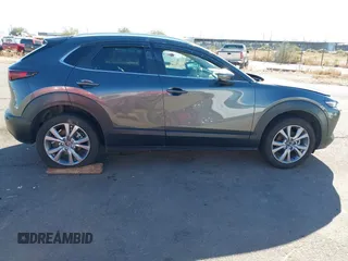 2022 Mazda CX-30 S Select z VIN 3MVDMBBL0NM415511, wystawiony jako IAAI lot #41513247 z przebiegiem Nie podano mil oraz . Historia ofert i sprzedaży dostępna na DreamBid. Obrazek 6.
