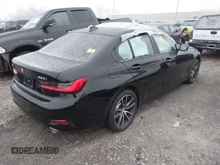 2020 BMW 3 Series 330i xDrive with VIN WBA5R7C08LFH44012, listed as a IAAI auction lot 41252675 with 57,486 mi miles. Bid and sale history available at carsss.com. Image 4.