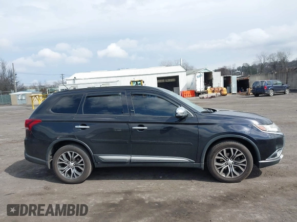 2016 Mitsubishi Outlander SE with VIN JA4AD3A39GZ003885, listed as a IAAI auction lot 41869646 with 193,320 mi miles and . Bid and sale history available at DreamBid. Image 13.