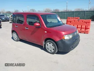 2011 Nissan Cube S z VIN JN8AZ2KR1BT212624, wystawiony jako IAAI lot #41767690 z przebiegiem 124 555 mil mil oraz . Historia ofert i sprzedaży dostępna na DreamBid. Obrazek 1.