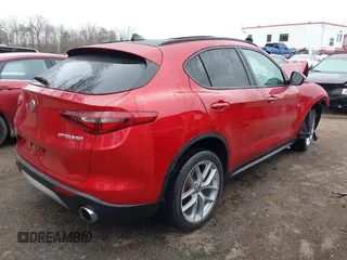 2019 Alfa Romeo Stelvio Ti z VIN ZASPAKBNXK7C31621, wystawiony jako IAAI lot #41773366 z przebiegiem 37 344 mil mil oraz . Historia ofert i sprzedaży dostępna na DreamBid. Obrazek 4.