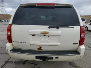 2010 Chevrolet Suburban LTZ with VIN 1GNUKKE35AR292291, listed as a Copart auction lot 49627085 with 233,359 mi miles and Salvage Title. Bid and sale history available at carsss.com. Image 6.