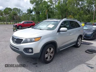 2012 Kia Sorento EX with VIN 5XYKUDA20CG206132, listed as a IAAI auction lot 42018015 with 138,158 mi miles. Bid and sale history available at carsss.com. Image 2.