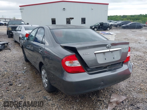 2004 Toyota Camry LE with VIN 4T1BE32K64U868802, listed as a IAAI auction lot 42141061 with 254,215 mi miles. Bid and sale history available at carsss.com. Image 3.