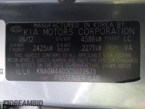 2012 Kia Optima Hybrid with VIN KNAGM4AD5C5022673, listed as a IAAI auction lot 41506860 with 121,982 mi miles. Bid and sale history available at carsss.com. Image 9.