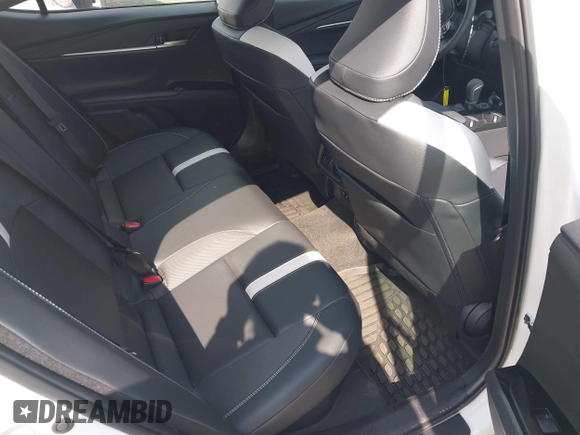 2025 Toyota Camry LE with VIN 4T1DAACK9SU084957, listed as a IAAI auction lot 41688859 with 7,396 mi miles and . Bid and sale history available at DreamBid. Image 8.