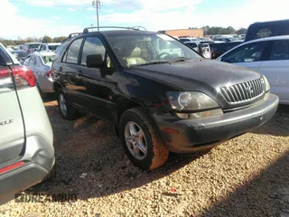1999 Lexus RX 300 Luxury SUV with VIN JT6HF10U7X0038014, listed as a IAAI auction lot 41244208 with 183,823 mi miles. Bid and sale history available at carsss.com. Image 1.