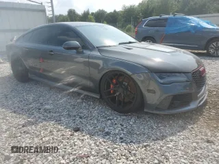 2014 Audi RS 7 Prestige z VIN WUAW2AFC0EN904083, wystawiony jako Copart lot #63479854 z przebiegiem 80 093 mil mil oraz Szkody całkowita. Historia ofert i sprzedaży dostępna na DreamBid. Obrazek 4.